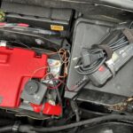 Accubewaker en druppellader mini camper